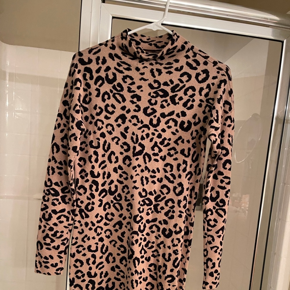 Brand new Nicole Miller sweater dress in a size small.